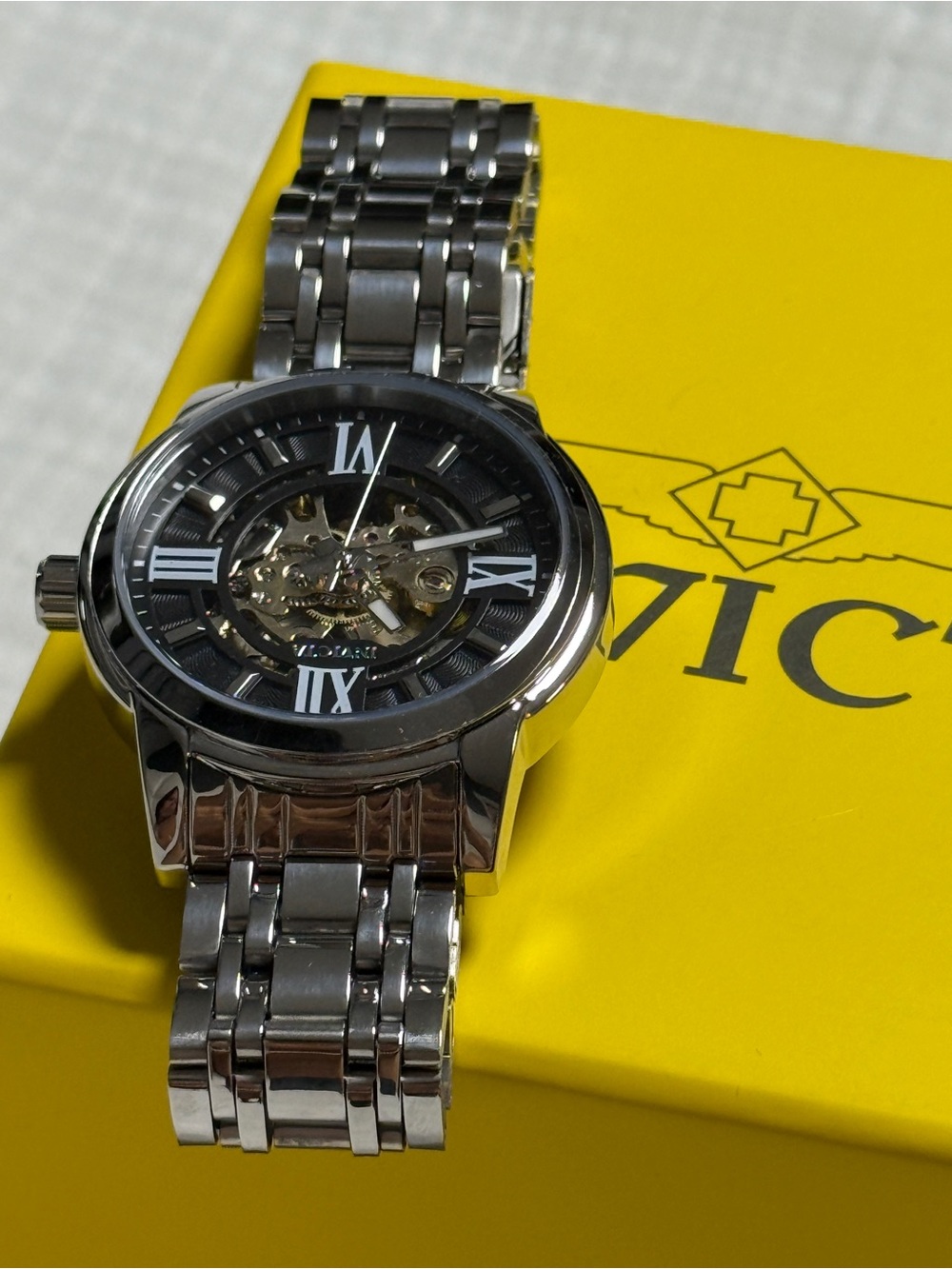 Invicta Silver Stainless Steel Men's Watch with Black Skeleton Dial